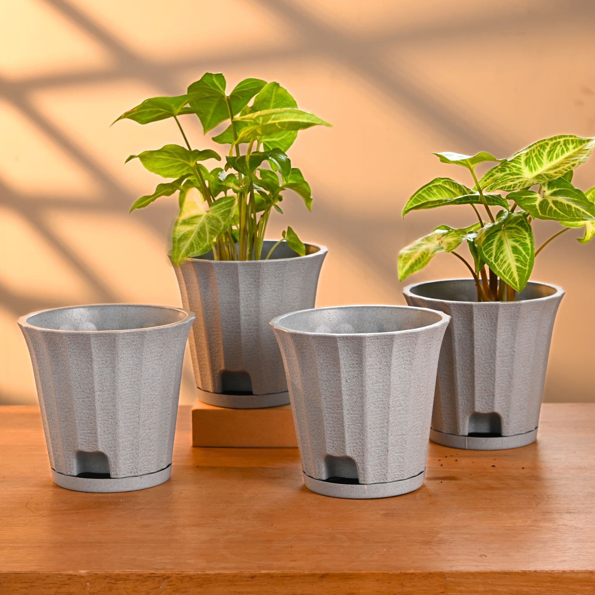 earth friendly ace 5 inch set of 4 small self watering pots for indoor plants plant pot made with bamboo fibers table top planters for home decor flower pot for living room - Thulira sustainable product