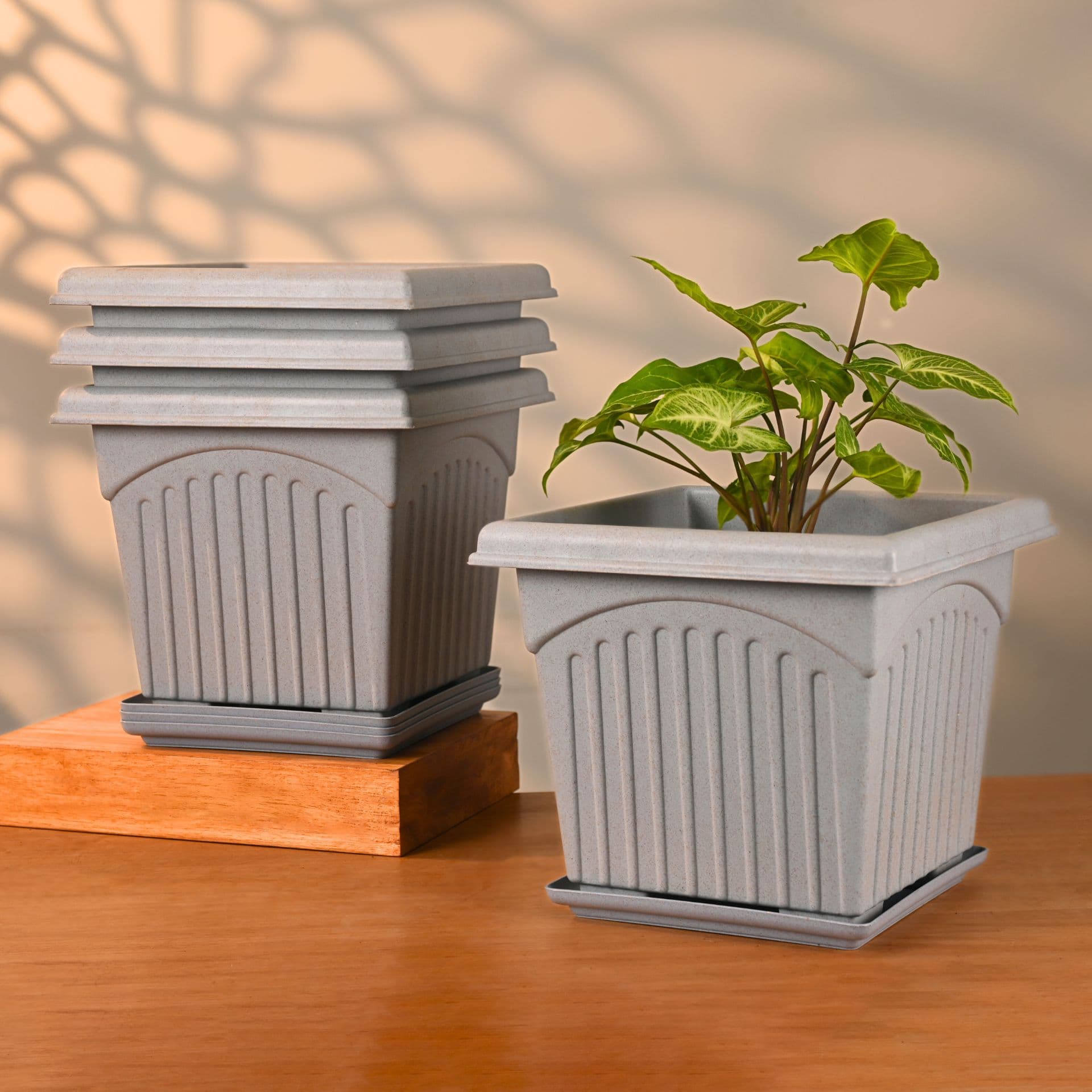 earth friendly 10 e2 80 b3 archway planters with tray set of 4 plant pot made with rice husk biocomposite uv protected drainage hole pots for indoor outdoor balcony garden - Thulira sustainable product