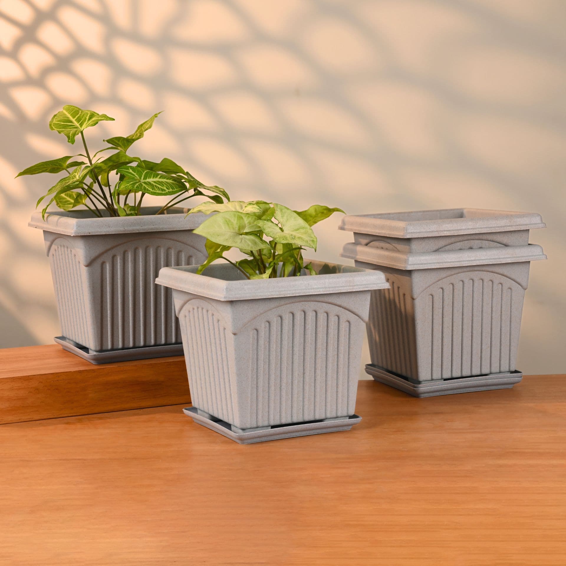 earth friendly 8 e2 80 b3 archway planters with tray set of 4 plant pot made with rice husk biocomposite uv protected drainage hole pots for indoor outdoor balcony garden - Thulira sustainable product